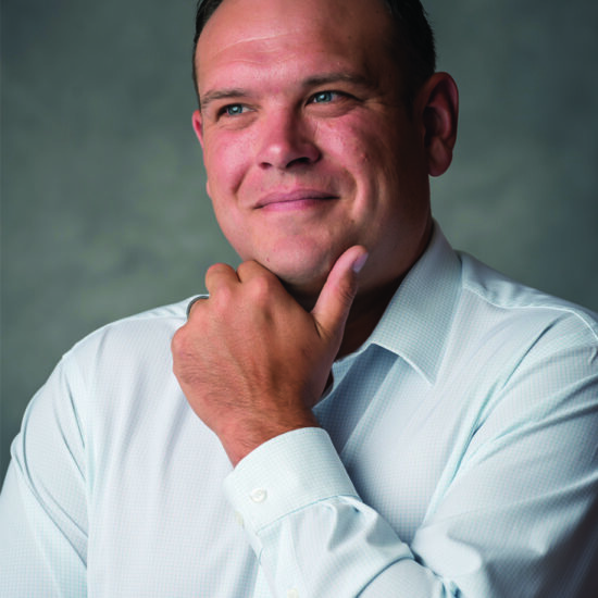 professional business headshot photo of man smiling