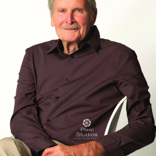 professional business headshot photo of man smiling