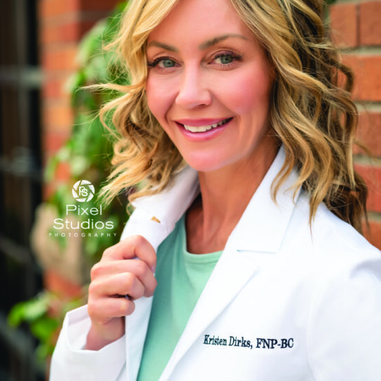 professional business headshot photo of woman doctor smiling