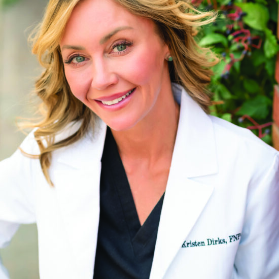 professional business headshot photo of woman doctor smiling