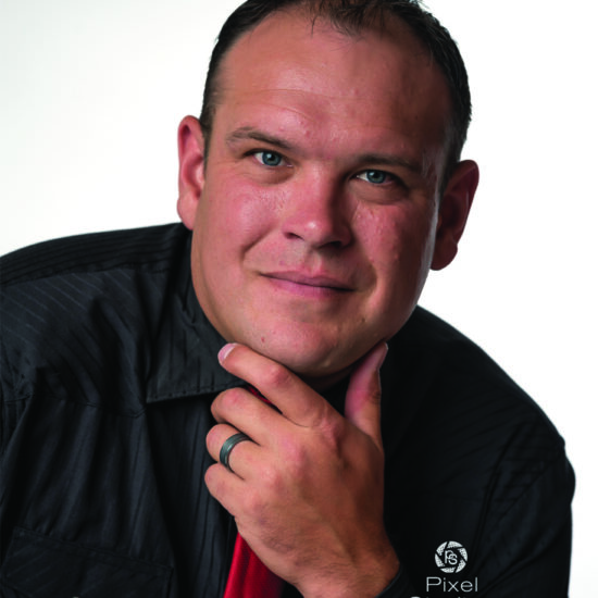 professional business headshot photo of man smiling